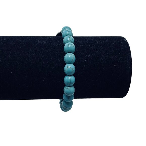 Faux Turquois Beads With Silver Tone Feather Stretch Bracelet (5493) - Picture 3 of 5